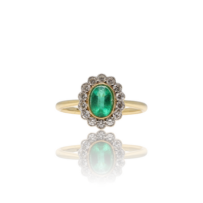 18CT YELLOW GOLD AND DIAMOND EMERALD RING