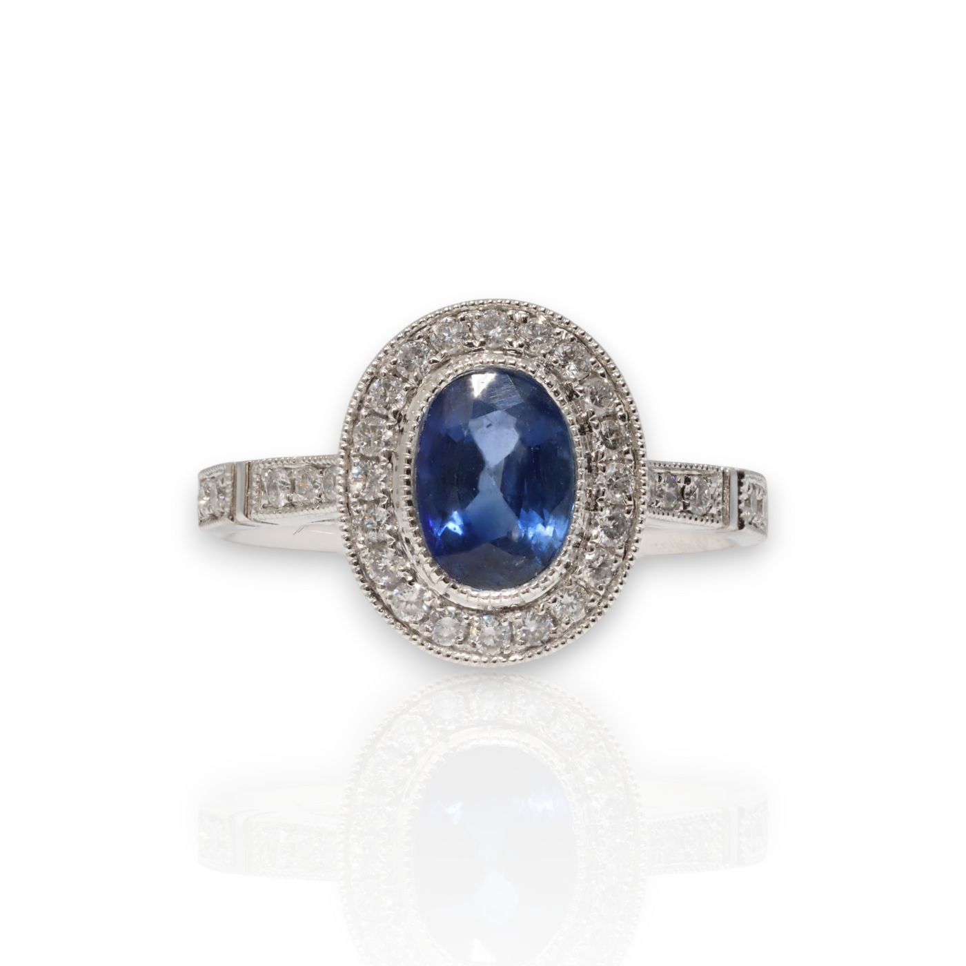 18CT WHITE GOLD SAPPHIRE AND DIAMOND RING