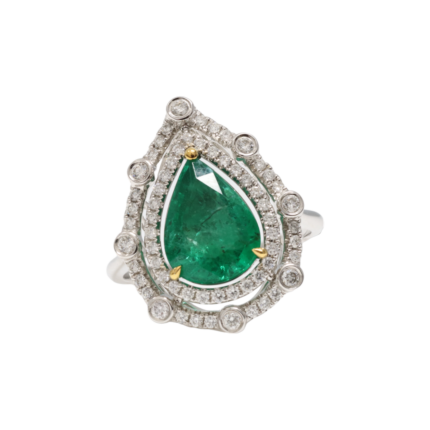 PEAR EMERALD AND DIAMOND RING