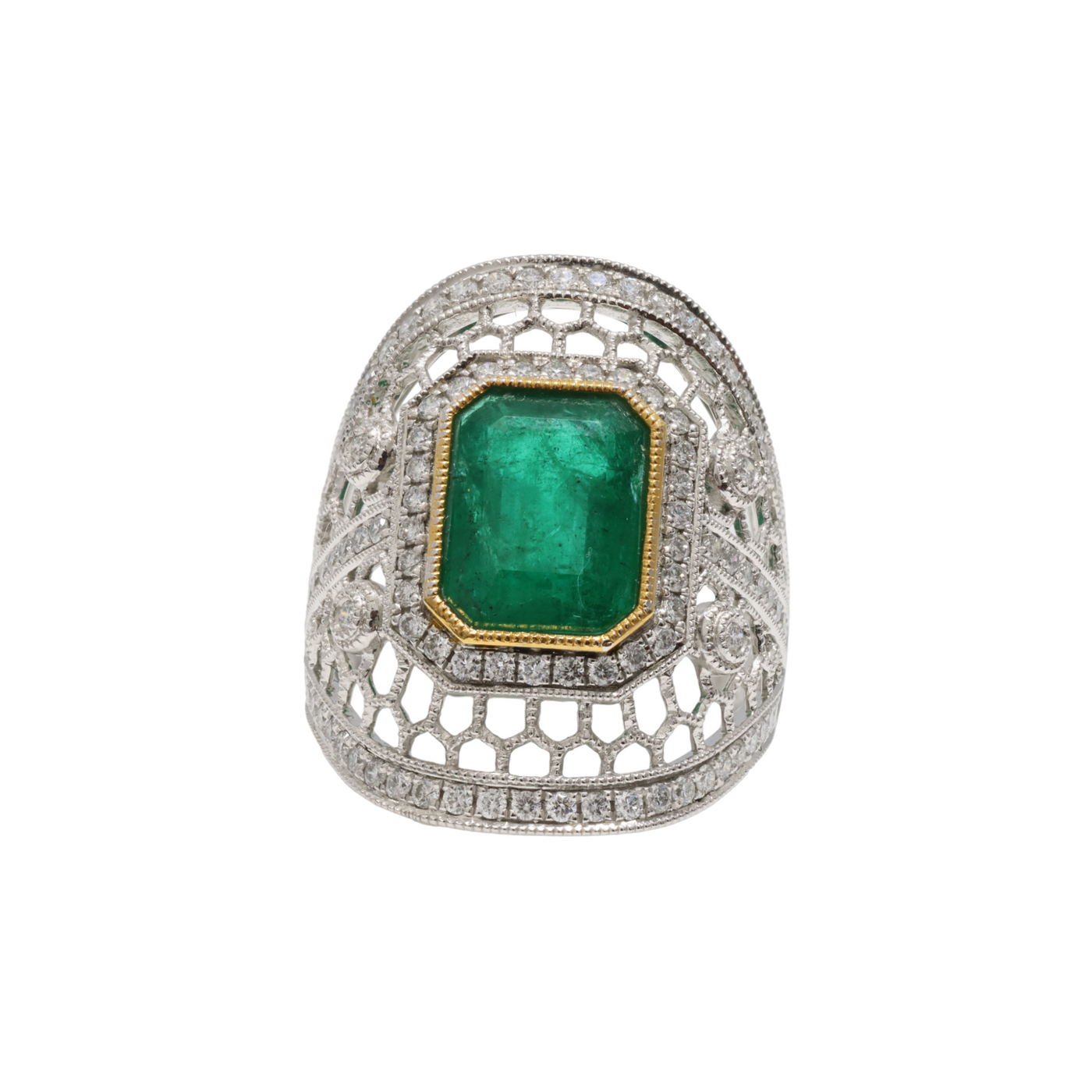 PLATINUM EMERALD AND DIAMOND DRESS RING