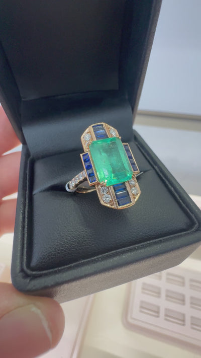 COLOMBIAN EMERALD , SAPPHIRE AND DIAMOND RING