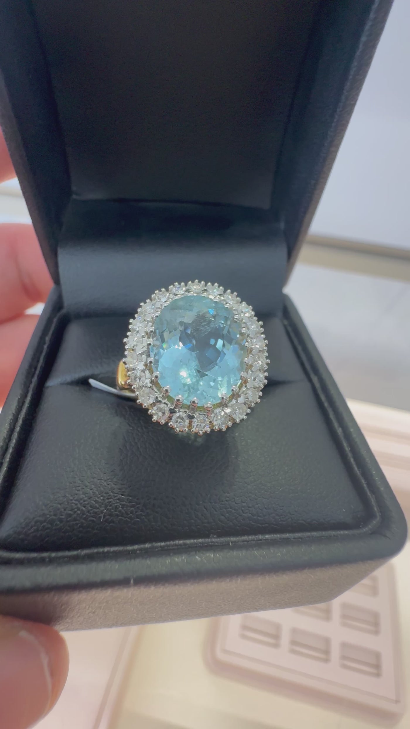 AQUAMARINE AND DIAMOND RING