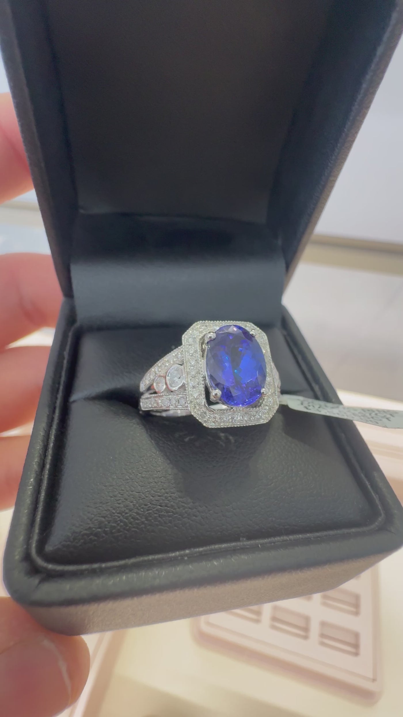 TANZANITE AND DIAMOND RING