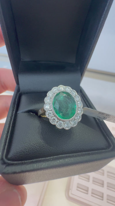 14CT YELLOW GOLD EMERALD AND DIAMOND RING