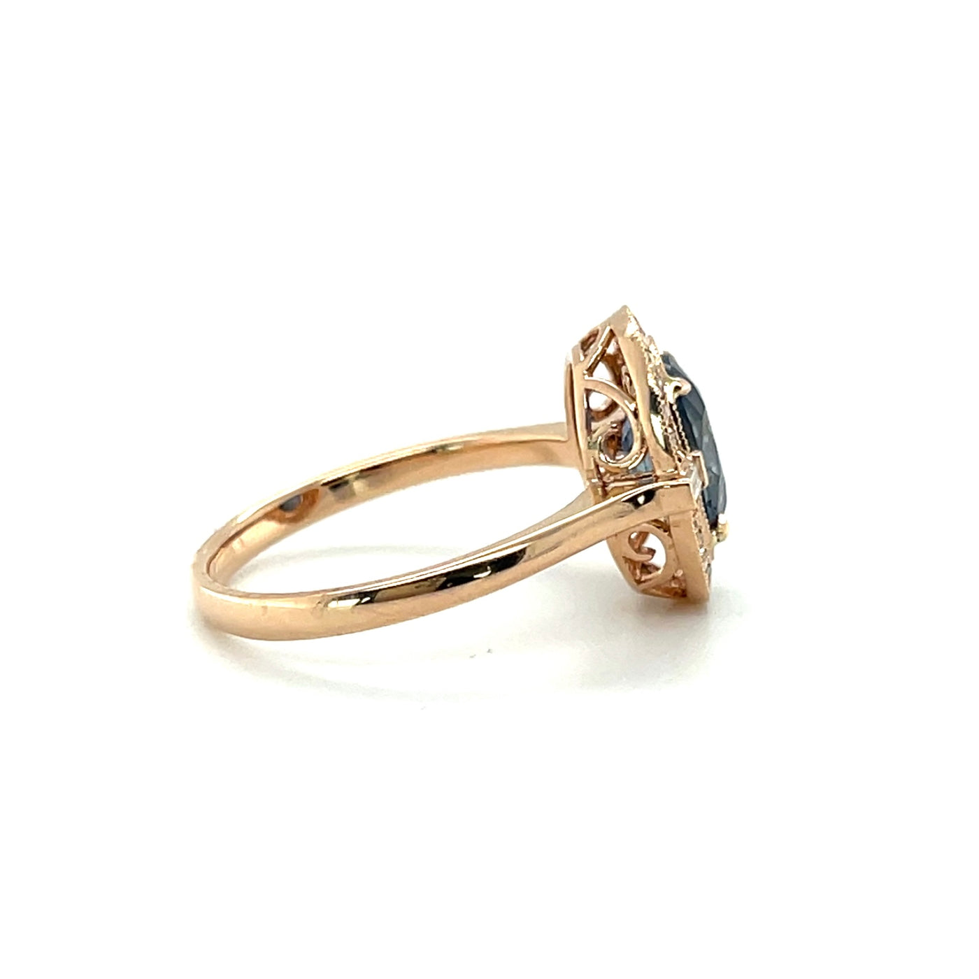 18CT ROSE GOLD SAPPHIRE AND DIAMOND RING