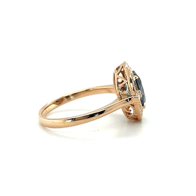 18CT ROSE GOLD SAPPHIRE AND DIAMOND RING