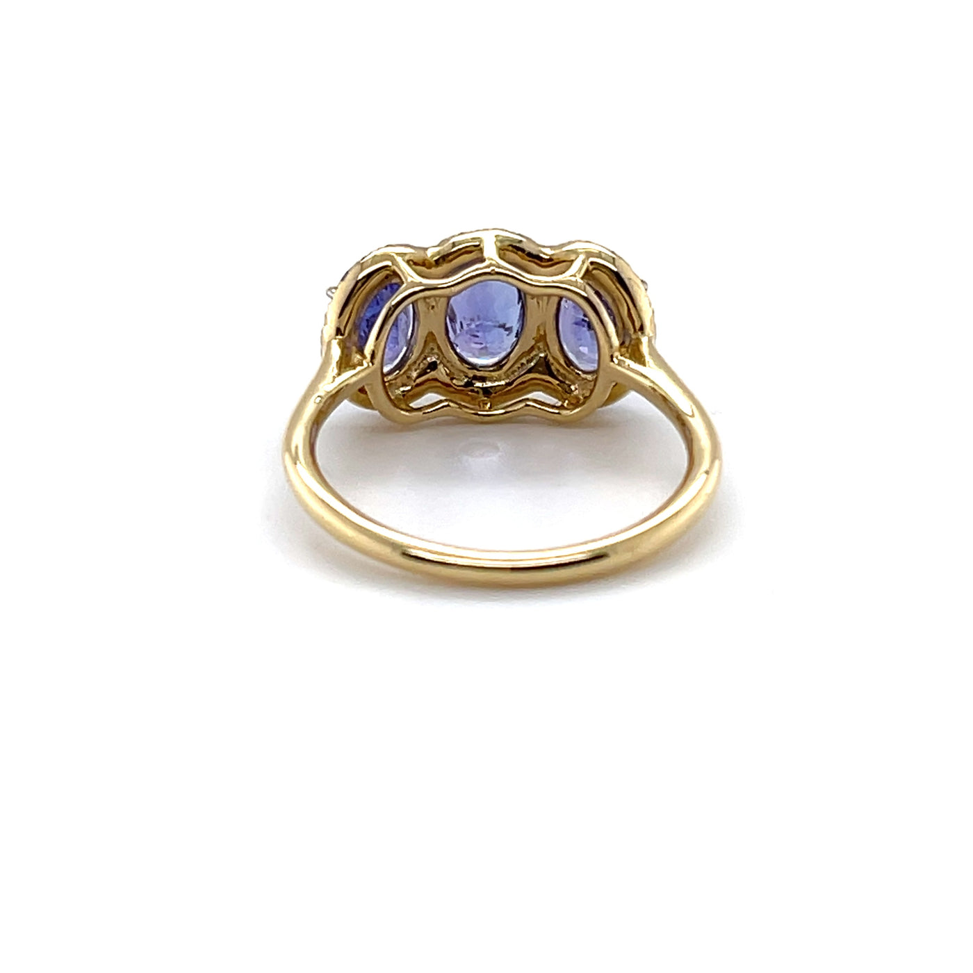 14CT YELLOW GOLD TANZANITE AND DIAMOND TRILOGY RING