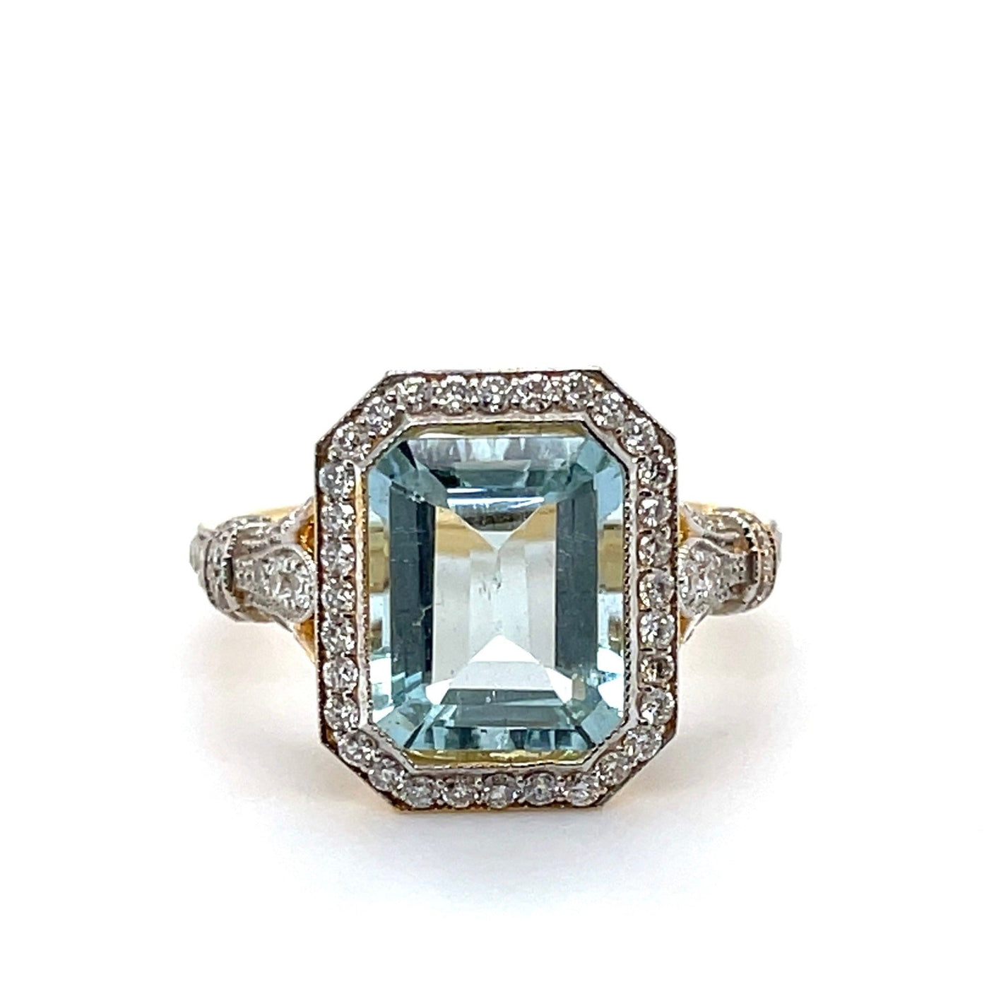 18CT YELLOW GOLD AQUAMARINE AND DIAMOND RING