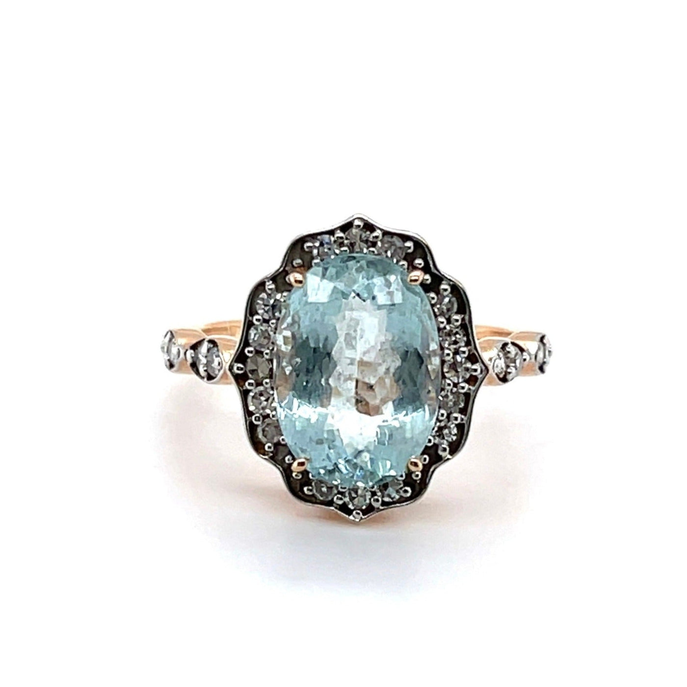 18CT ROSE GOLD AQUAMARINE AND DIAMOND RING