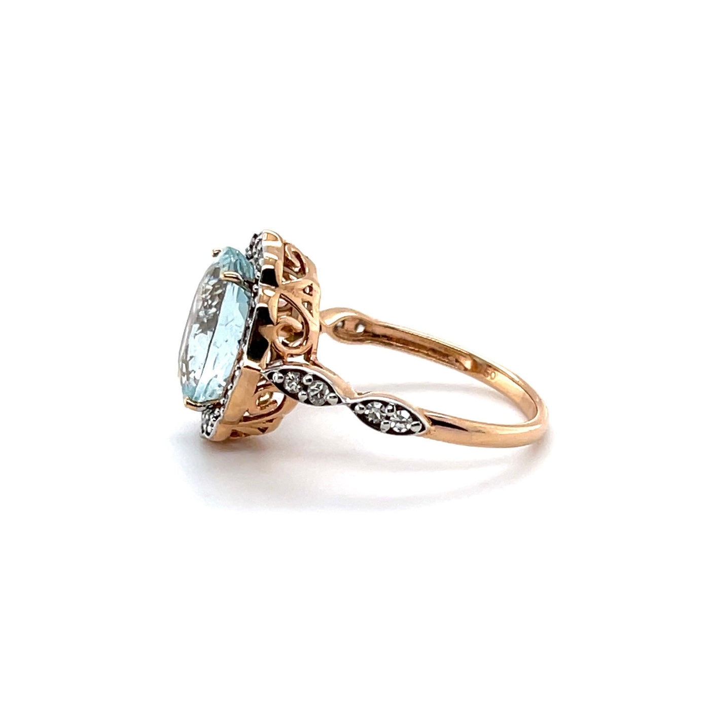 18CT ROSE GOLD AQUAMARINE AND DIAMOND RING