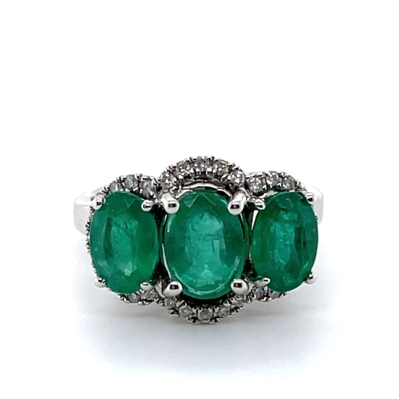 18CT WHITE GOLD TRILOGY EMERALD AND DIAMOND RING