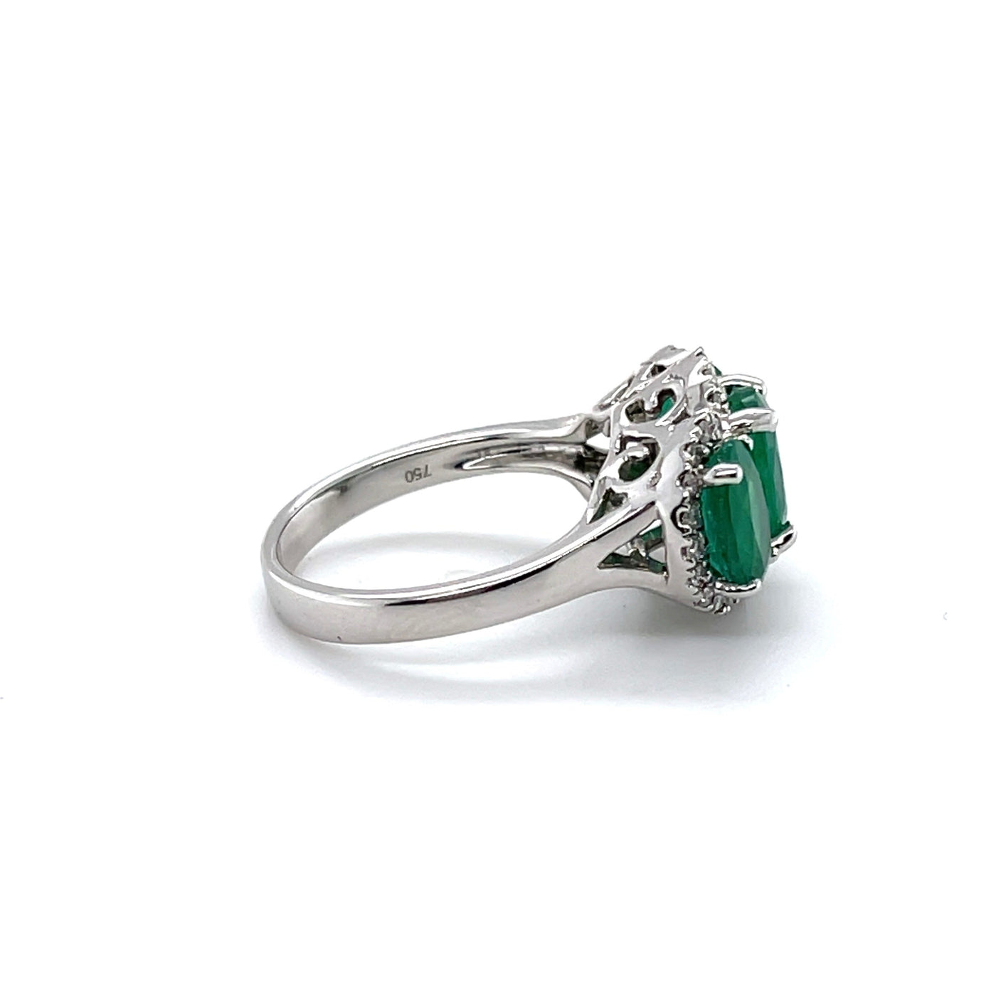 18CT WHITE GOLD TRILOGY EMERALD AND DIAMOND RING