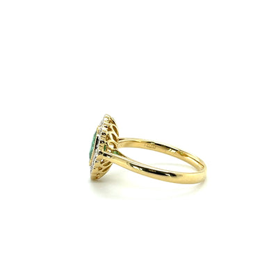 18 CT YELLOW GOLD EMERALD AND DIAMOND RING