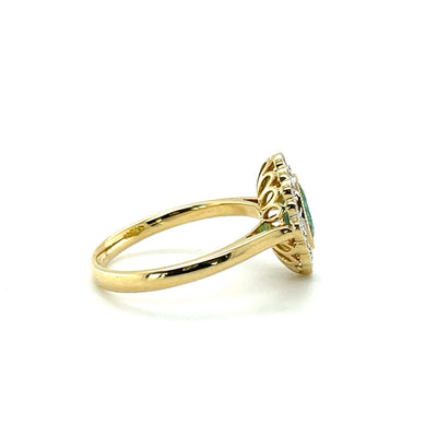 18 CT YELLOW GOLD EMERALD AND DIAMOND RING