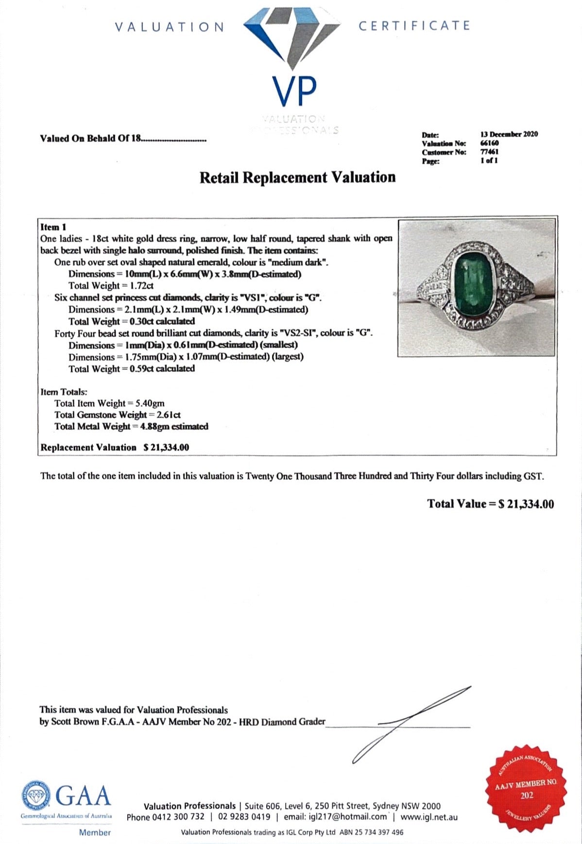 18CT WHITE GOLD EMERALD AND DIAMOND RING