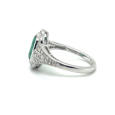 18CT WHITE GOLD EMERALD AND DIAMOND RING