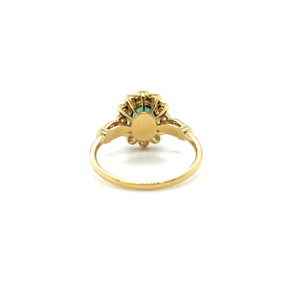 18CT YELLOW GOLD EMERALD AND DIAMOND RING