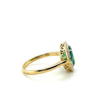 18CT YELLOW GOLD EMERALD AND DIAMOND RING