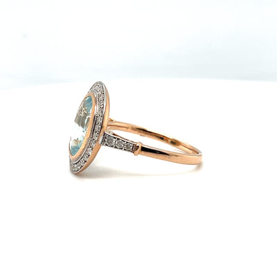 18CT ROSE/WHITEGOLD AQUAMARINE AND DIAMOND COCKTAIL RING