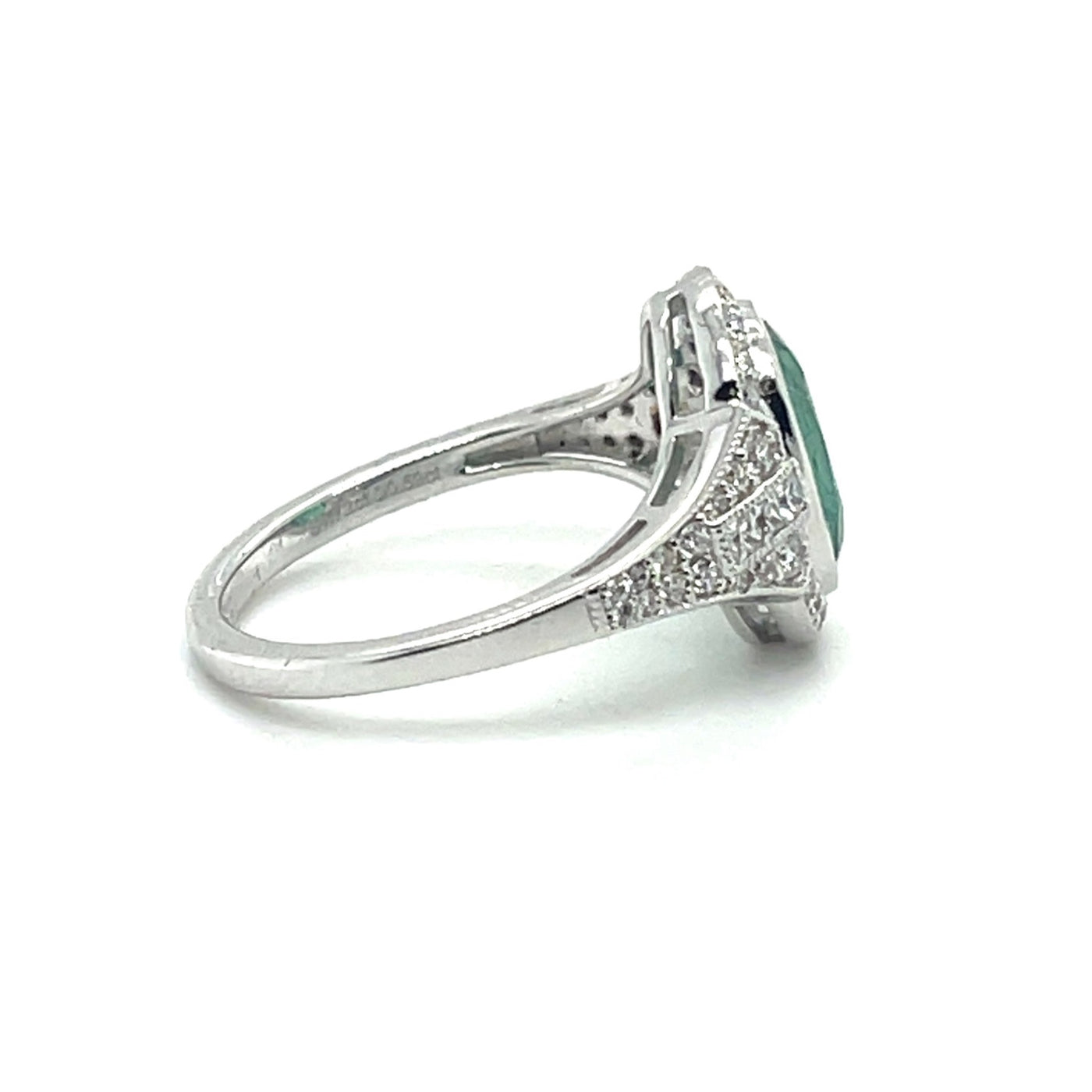 18CT WHITE GOLD EMERALD AND DIAMOND RING