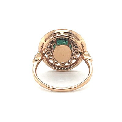 18CT ROSE GOLD EMERALD AND DIAMOND RING